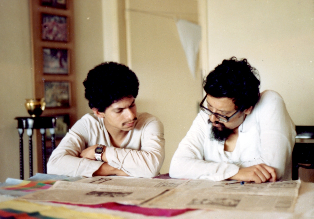 Trying to solve a crossword puzzle with his brother-in-law Raja, Gurusaday Road, Calcutta, mid-1980s